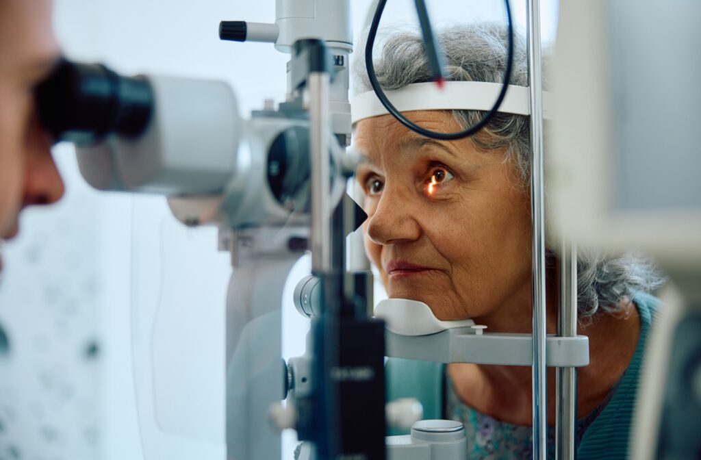 A patient having a comprehensive eye exam at their local optometrist's office.